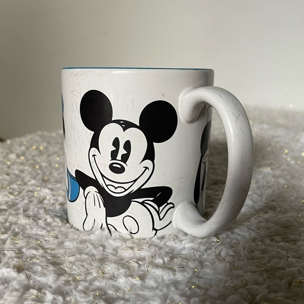 Disney store Mickey Mouse coffee cup well loved collectible Disney memorabilia